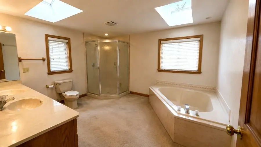 Walk-in shower and freestanding tub in South Surrey, before