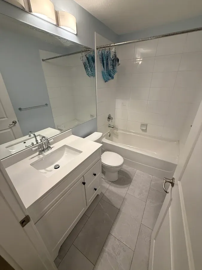 Water damage around the toilet, torn out and rebuilt in White Rock, after