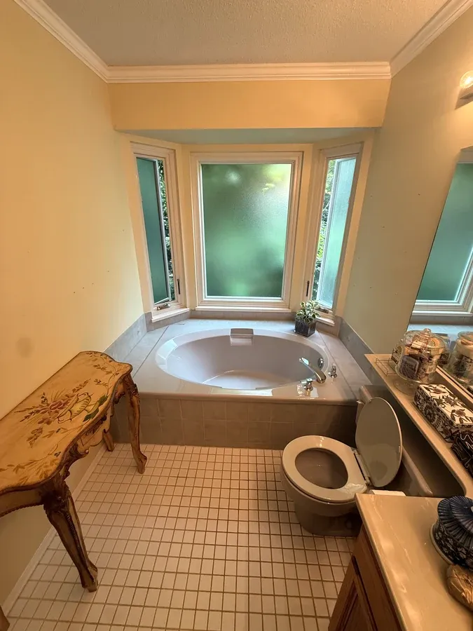 Jacuzzi tub to curb-less shower in South Surrey, before