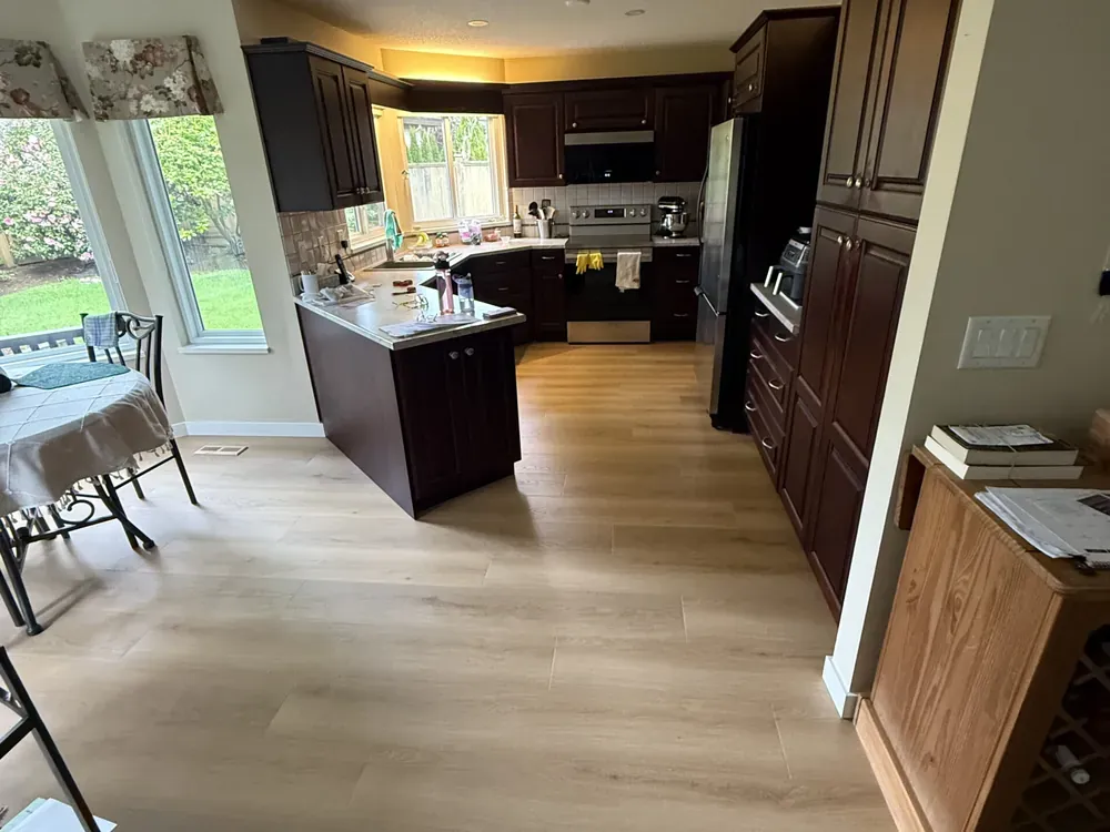 New flooring through the kitchen and dining room in South Surrey, after