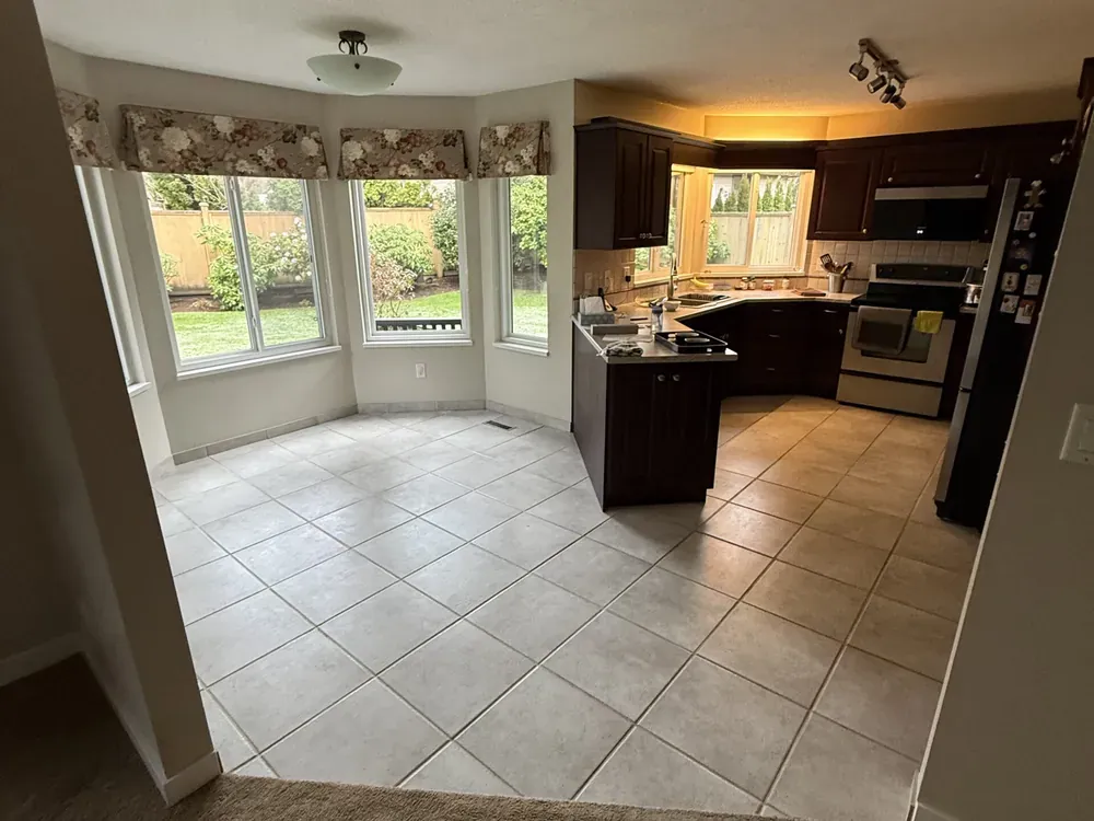New flooring through the kitchen and dining room in South Surrey, before