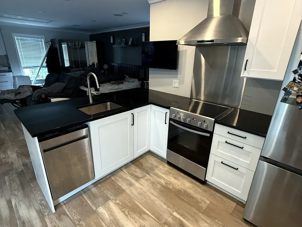 Refaced cabinets, extended counters, an undermount sink in South Surrey, before